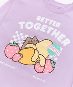 Front view of the Pusheen Fruits Better Together Sweatshirt. The text on the sweatshirt is printed in white. The phrases on the front graphic say "Better Together," "100% Real Cute," and "Net wt. 4 oz".