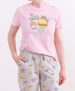 A close-up view of the grey adjustable drawstring on the Pusheen pajama pants. The light grey adjustable ribbon sits in a thin, stretchy waistband.  