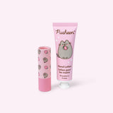 Pusheen strawberry hand lotion and unscented lip balm set has pink packaging with strawberry graphics. 