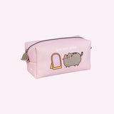 Front and side view of the Pink Pusheen cosmetic bag. The loaf shaped bag has printed graphics on all sides of the bag. The front graphic shows Pusheen the Cat blushing and winking at herself in front of a mirror with the phrase "you look good" above the cat.