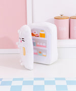Back view of the Pusheen's Kitchen Refrigerator Plush. Pusheen's striped tail extends off the bottom back of the plush and alternates between white and light pink colors.